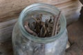 Old rusty nails in a glass jar Royalty Free Stock Photo