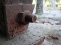 Old rusty nut bolt close up