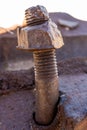 Old Rusty Nut Fused To Bent Bolt In The Ruins Of Ore Terminal Royalty Free Stock Photo