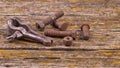 Old rusty nuts, bolts. Ancient tools. boards Royalty Free Stock Photo