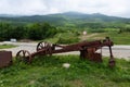 An old rusty one-bottomed iron plow for plowing the soil for vineyards Royalty Free Stock Photo