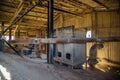 Old rusty oven inside the elevator of an abandoned lime plant