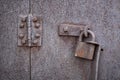 Old rusty padlock and hinge. Royalty Free Stock Photo