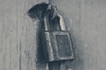 Old rusty padlock on red painted door Royalty Free Stock Photo