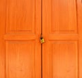 Old rusty padlock on white weathered wooden door Royalty Free Stock Photo