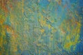 Old rusty painted metal wall. Blue green yellow orange abstract background for design. Royalty Free Stock Photo