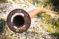 Old rusty pipeline with flange and bolts Royalty Free Stock Photo