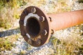 Old rusty pipeline with flange and bolts Royalty Free Stock Photo