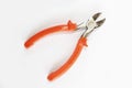 Old rusty pliers tools, metal cutting pliers with orange handle