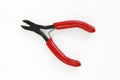 Old rusty pliers tools, metal cutting pliers with red handle