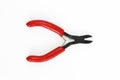 Old rusty pliers tools, metal cutting pliers with red handle