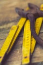 Old rusty pliers and wooden meter