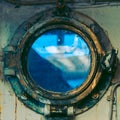 Old rusty porthole of a boat with a Lot of patina Royalty Free Stock Photo