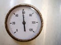 Old rusty pressure gauge to measure temperature of an aluminum tank
