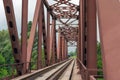 Old rusty railway bridge over the river Royalty Free Stock Photo