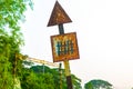 Old rusty railway level crossing signal or sign Royalty Free Stock Photo