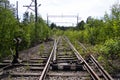 Old rusty railway tracks with wooden sleepers Royalty Free Stock Photo