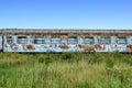 Old rusty railway wagon whit broken windows. Royalty Free Stock Photo