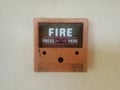 Old rusty red fire alarm box  in white background Royalty Free Stock Photo