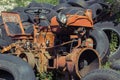 Old rusty red vintage tractor in a farm Royalty Free Stock Photo