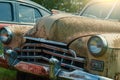 Old rusty retro vintage car with peeling paint close up, abandoned auto Royalty Free Stock Photo