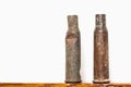 Old rusty rifle cartridges from the second world war on a white background Royalty Free Stock Photo