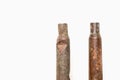 Old rusty rifle cartridges from the second world war on a white background. Royalty Free Stock Photo