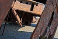 old rusty and rotten ship wreck with holes in carcass Royalty Free Stock Photo