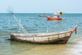 Old rusty rowboat for fishing parking near the beach Royalty Free Stock Photo