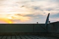 Old rusty satellite antenna dish on top of the building Royalty Free Stock Photo