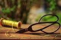 Old rusty scissors gold string wooden sharp table garden