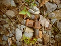 Old rusty screws laying on stone path Royalty Free Stock Photo