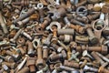 Old rusty screws, nuts and bolts background