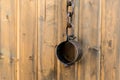 Old rusty shackles closed rusty traditional handcuffs vertical wall design Royalty Free Stock Photo