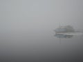 Old rusty ship in fog in spring Royalty Free Stock Photo