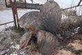 old rusty ship propeller in the trash heap Royalty Free Stock Photo