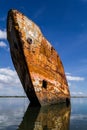 Old rusty ship run aground or beached