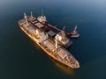 Old rusty ships side by side. Shipwrecks in Greece. Royalty Free Stock Photo