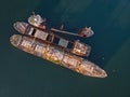 Old rusty ships side by side. Shipwrecks in Greece. Royalty Free Stock Photo