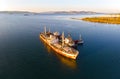 Old rusty ships side by side. Shipwrecks in Greece. Royalty Free Stock Photo