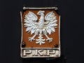 Old, rusty sign of polish railways PKP Royalty Free Stock Photo
