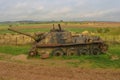 An old rusty Soviet anti-tank self-propelled artillery system SU-100