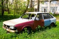 Old rusty Soviet car with broken glass. Royalty Free Stock Photo