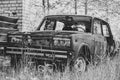 Old rusty Soviet retro car in an abandoned city Royalty Free Stock Photo