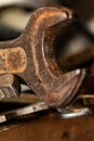 Old rusty spanners in a wooden box. Old rusty tools closeup