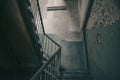 Old rusty staircase in an abandoned house.