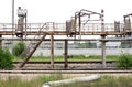 Old rusty staircase from warehouse to cat walk