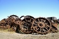 Old rusty steel tractor wheels Royalty Free Stock Photo