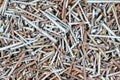 Old rusty steel and used metal nails macro in flat lay background Royalty Free Stock Photo