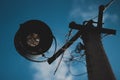 An old rusty street lamp on a street pole Royalty Free Stock Photo